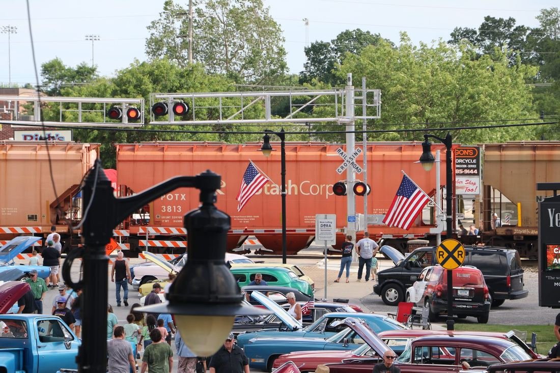 A stopped train blocking a crossing in downtown New Haven, Indiana